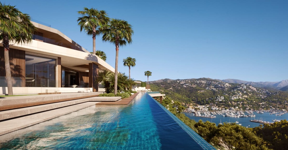 Luxury private villa overlooking the Mediterranean, reflecting resilient high-end travel demand despite Bitcoin market volatility.